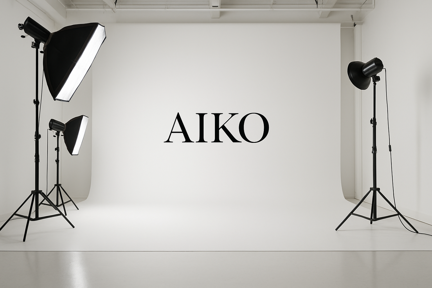 a studio with white background and a sign that says AIKO